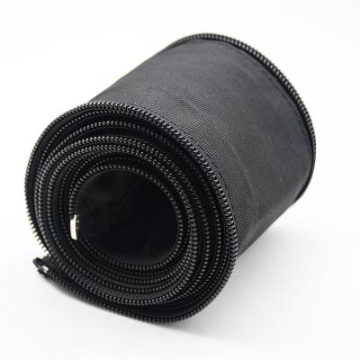 Funda para gestión de cables con cremallera flexible y envoltura trenzada